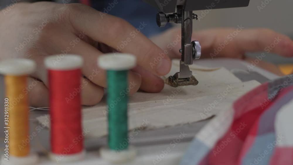 Fixing sewing machine after broke. Time lapse of putting back parts of sewing machine. Fixing concept.