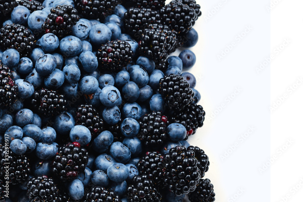 Blackberry and blueberry background. Top view. Blackberry and blueberry background. Top view.