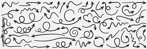 Set of black curved doodle arrows isolated on light background.