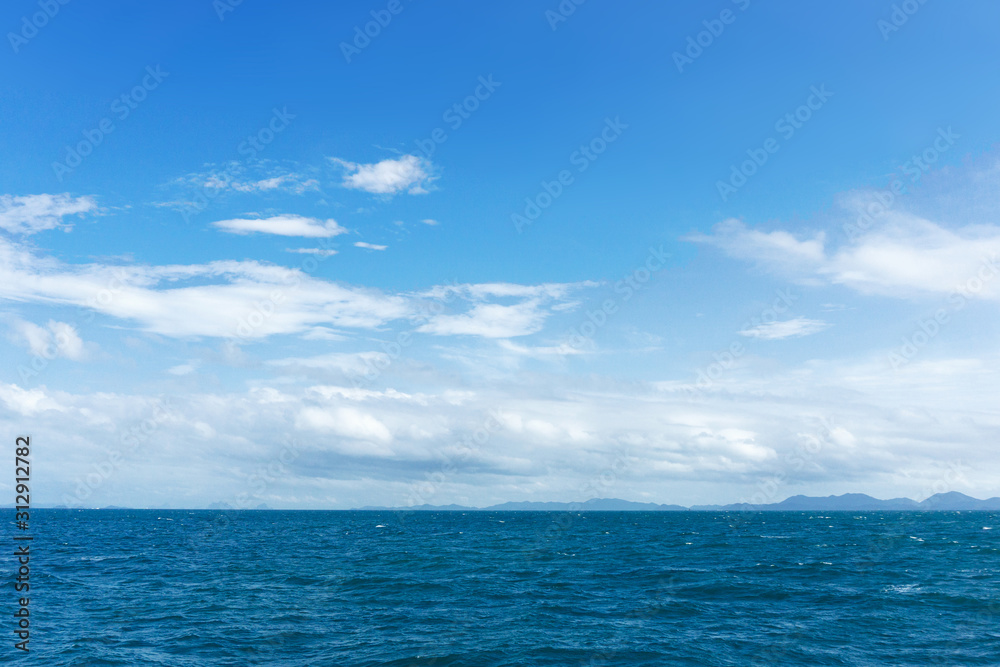 Blue sky over ocean water panoramic view. Summer sailing holiday background. Blue sky over ocean water panoramic view. Summer sailing holiday background.