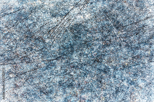 Grunge scratched metal surface background.