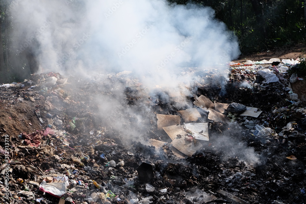 MAEHONGSON PROVINCE, THAILAND-DECEMBER 23 2016, Waste from household in waste landfill. Waste burning in dumping site in THAILAND