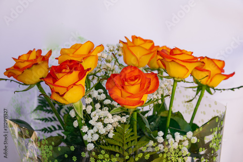 Orange roses bouquet, with white background