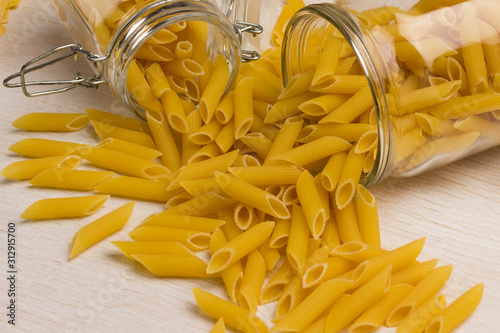 Organic food.Variety of types and shapes of dry Italian pasta. .