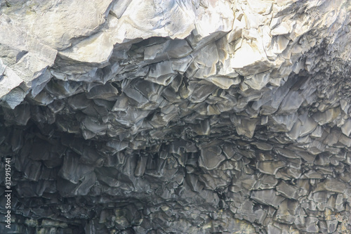 The texture of the basalt cave in Iceland closeup
