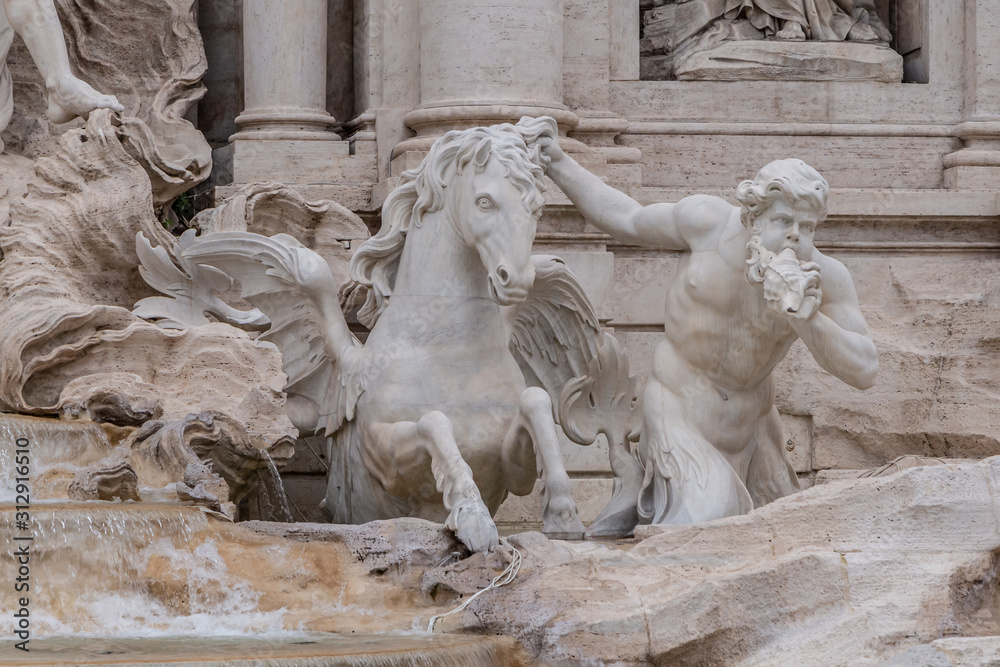 Statues at Trevi fountain (Fontana di Trevi) in Rome, Italy Statues at Trevi fountain (Fontana di Trevi) in Rome, Italy