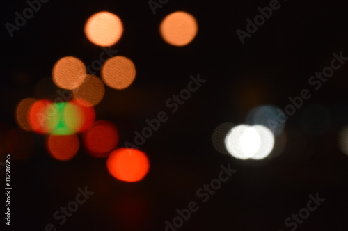 Bokeh of lights decorated in trees And the bright light post © Nantwich