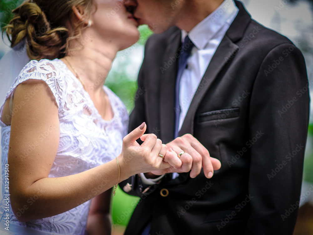 bride and groom holding hands