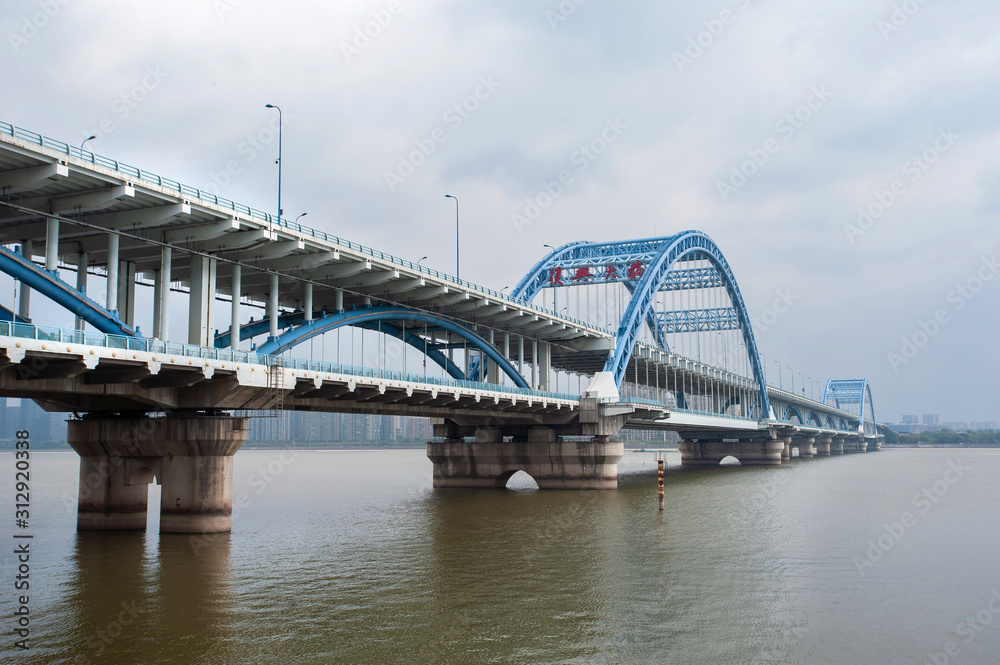 Fuxing Bridge on the Qiantang River, Hanghzou, China. The sign on the bridge reads 'Fuxing Big Bridge' in traditional Chinese. Fuxing Bridge on the Qiantang River, Hanghzou, China. The sign on the bridge reads 'Fuxing Big Bridge' in traditional Chinese.