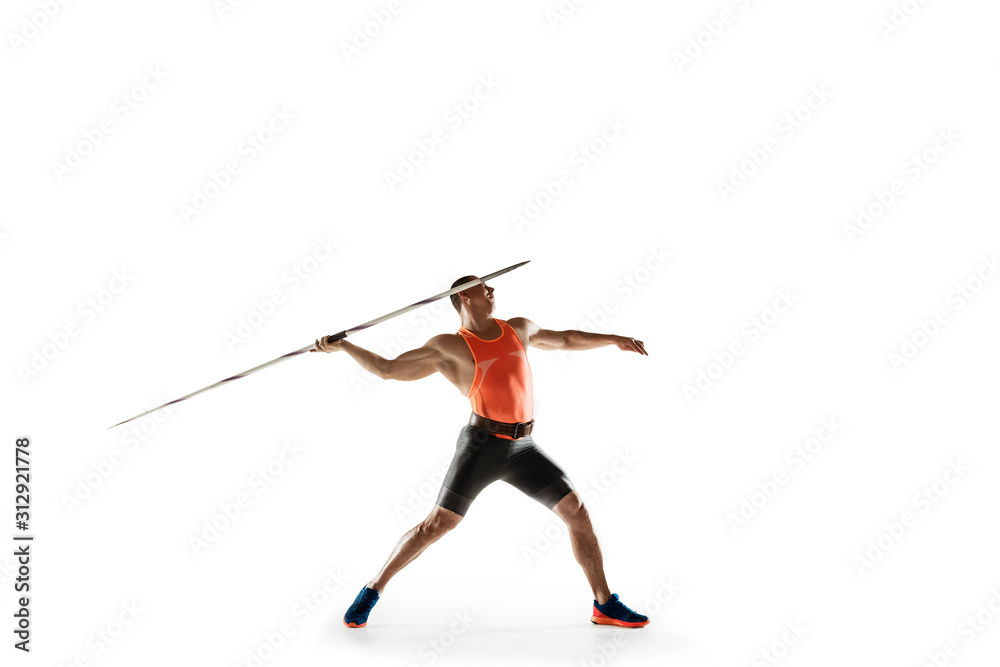 Male athlete practicing in throwing javelin isolated on white studio background. Professional sportsman training in motion, action. Concept of healthy lifestyle, movement, activity. Copyspace.