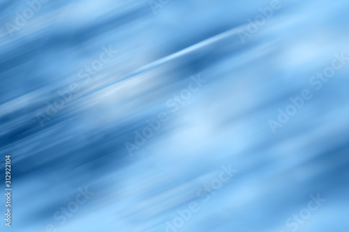 Classic blue blurred gradient background. Mixed motion texture. Abstract diagonal lines wallpaper