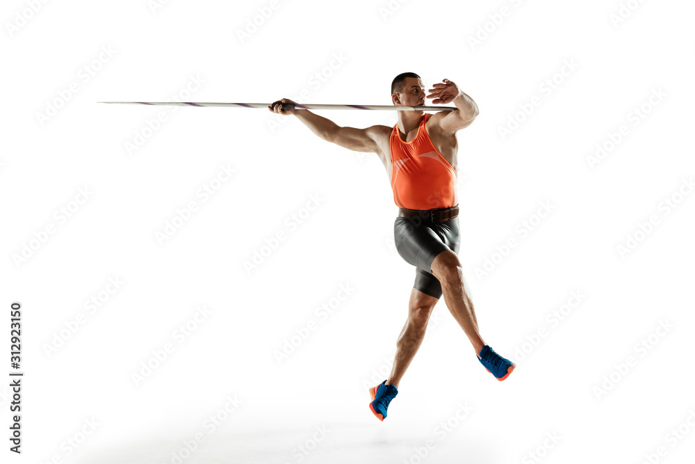 Male athlete practicing in throwing javelin isolated on white studio background. Professional sportsman training in motion, action. Concept of healthy lifestyle, movement, activity. Copyspace.