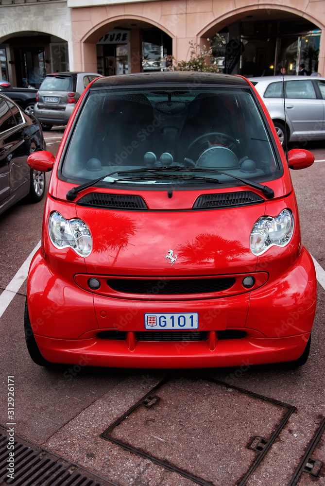 red ferrari smart car Stock Photo | Adobe Stock