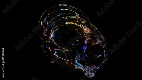  Soap bubble in the night city. Reflection of light on a soapy surface