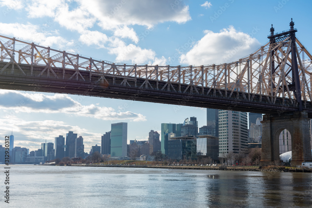 Queensboro Bridge along the East River with the Midtown Manhattan Skyline in New York City