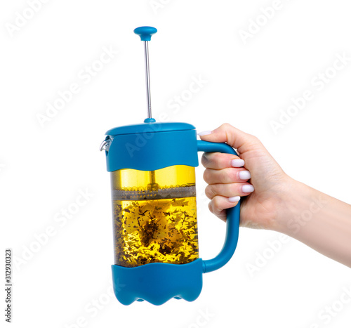 French Press teapot in hand on white background isolation