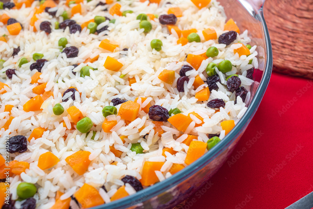 Greek-Style Rice. Brazilian dish. In this image contains rice, raisins ...