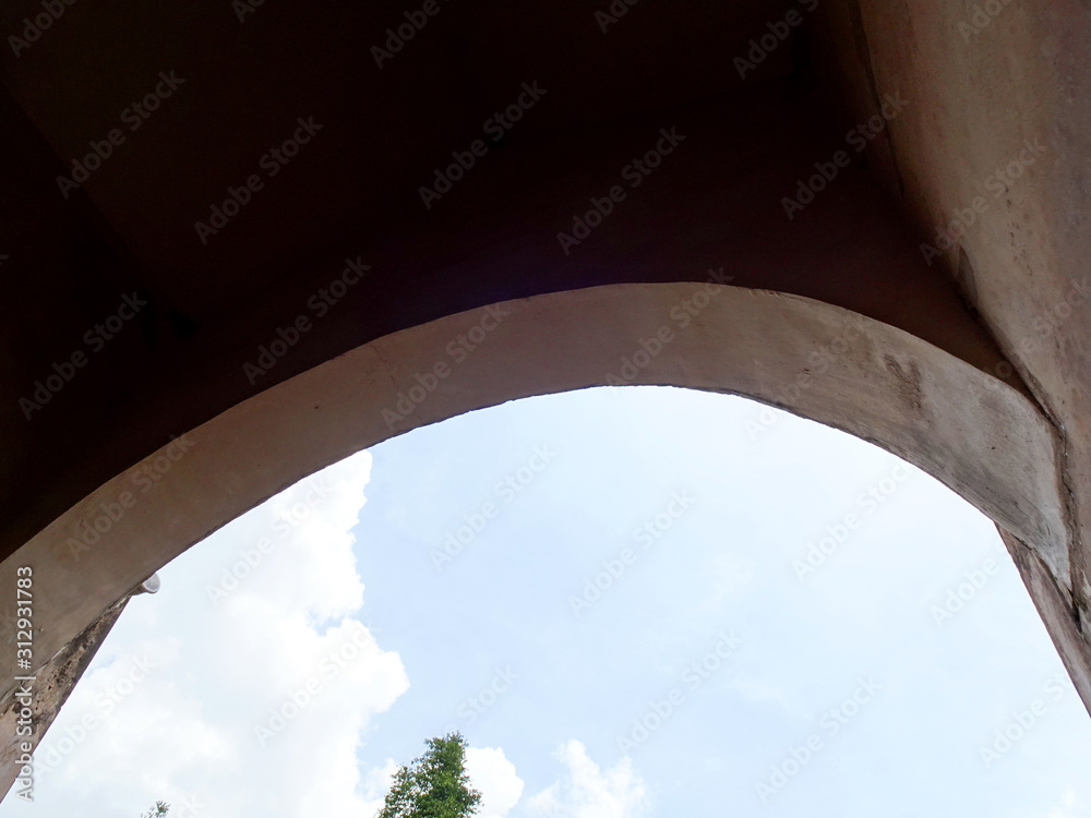 Arch wall and blue sky in Taman Sari water castle, Yogyakarta