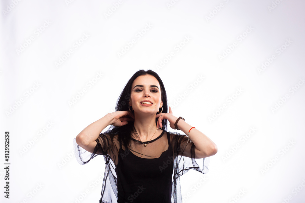 Young beautiful brunette girl on white background Young beautiful brunette girl on white background