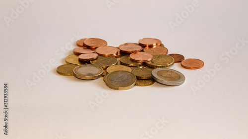 pile of coins isolated on white background