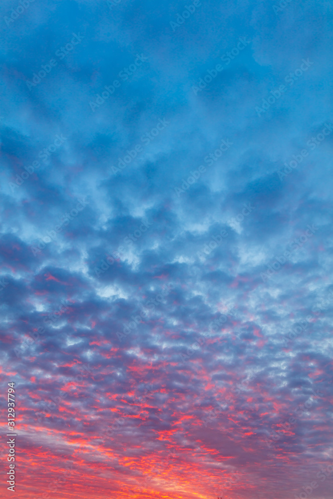 Beautiful clouds at dawn as a background