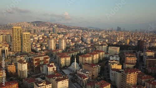 Aerial over Istanbul Suburbs. Over dense residential area with many buildings. Istanbul, the most populous city in Turkey. Metropolitan housing and suburban architecture photo