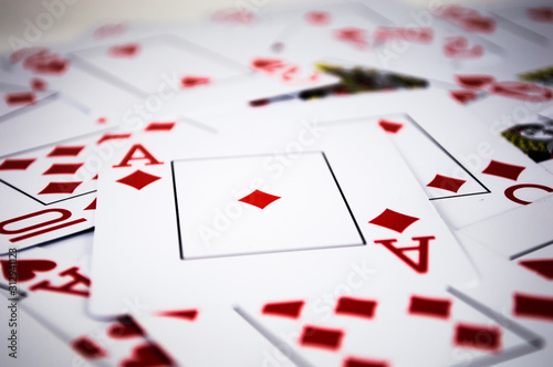 Red playing cards in chaos