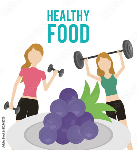 women with barbell dumbbell and grapes health food
