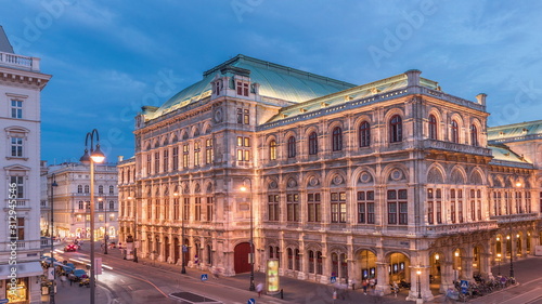 Fototapeta Naklejka Na Ścianę i Meble -  Beautiful view of Wiener Staatsoper aerial day to night timelapse in Vienna, Austria