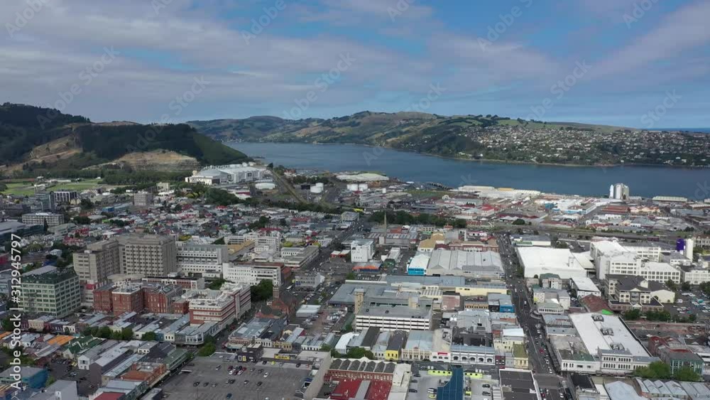 aerial view over dunedin in new zealand, east coast city dunedin in new zealand, drone shot over an amazing city in new zealand aerial view over dunedin in new zealand, east coast city dunedin in new zealand, drone shot over an amazing city in new zealand