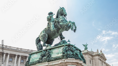Equestrian statue of Prince Eugene of Savoy timelapse hyperlapse in front of Hofburg palace, Heldenplatz, Vienna, Austria.