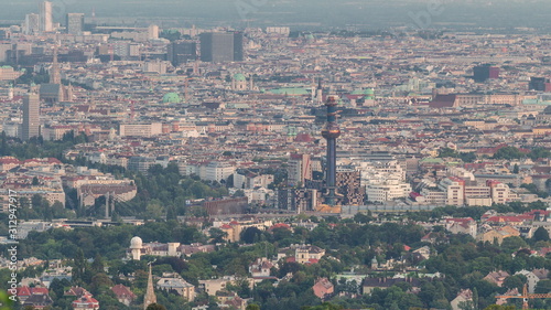 Skyline of Vienna from Danube Viewpoint Leopoldsberg aerial day to night timelapse. photo