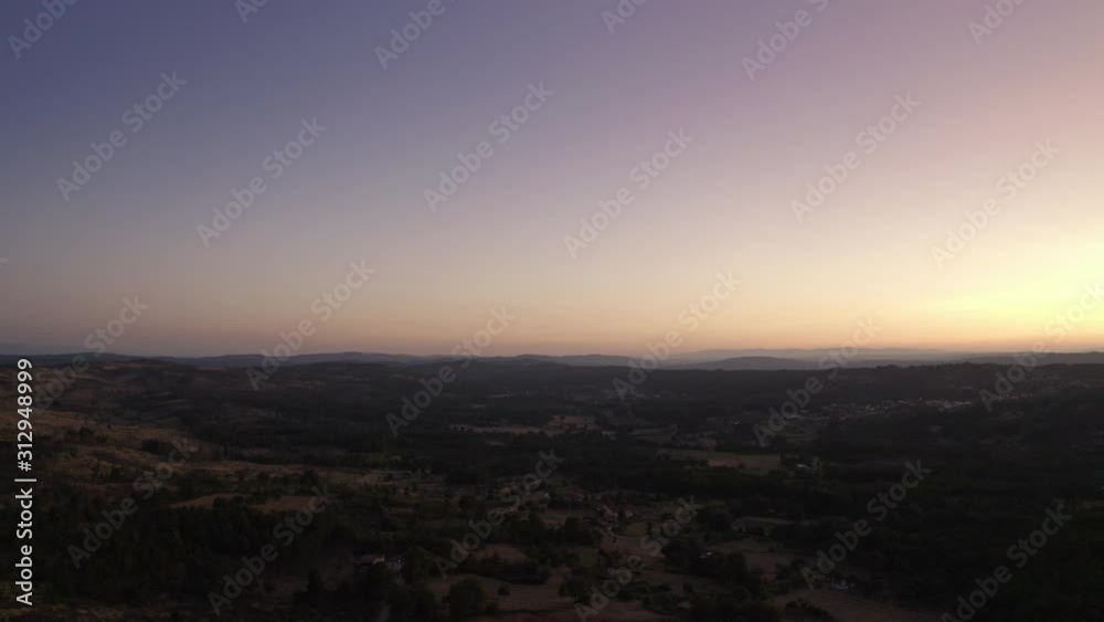 Sunset on a remote village in the middle of a mountain. Aerial view shot by drone at the north of Portugal mountains. Sunset on a remote village in the middle of a mountain. Aerial view shot by drone at the north of Portugal mountains.