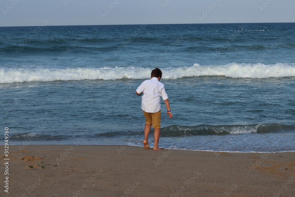 little boy at the shore
