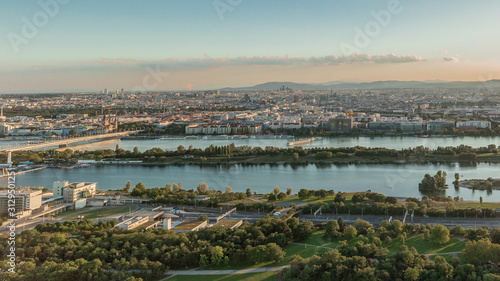 Photography Aerial panoramic view of Vienna city with skyscrapers, historic buildings and a riverside promenade timelapse in Austria