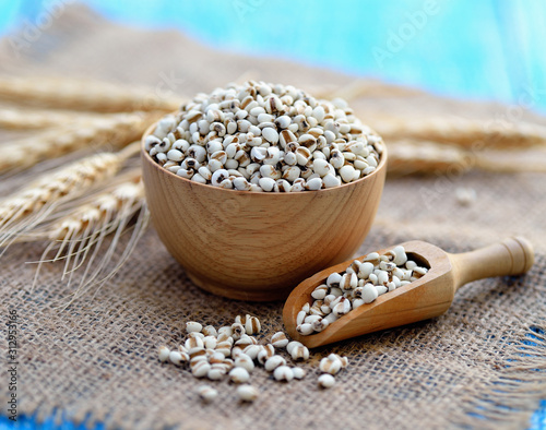 Job's Tears in wooden bowl and spoon