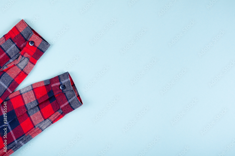 Fototapeta premium Textile, shirt composition on color background. Flat lay.