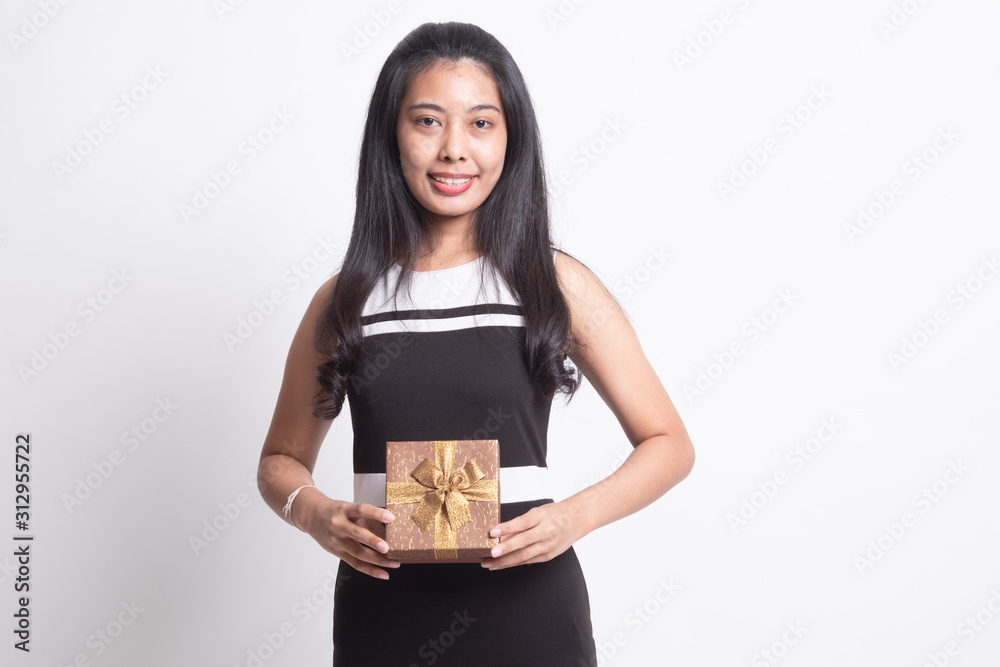 Young Asian woman with a gift box. Young Asian woman with a gift box.