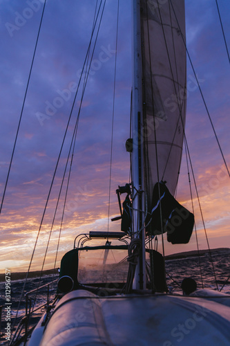 Fototapeta Naklejka Na Ścianę i Meble -  Sailing at sunrise