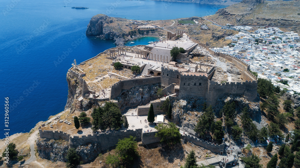 Panoramic aerial view of Lindos village and ancient Acropolis, Rhodes island, Greece.