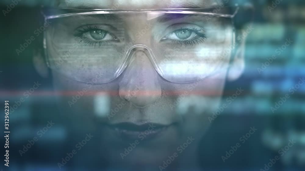 Young woman with holographic glasses. Futuristic. Augmented reality. Dark. More options in my portfolio.