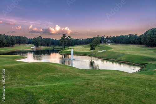 Golf Course with Pond and Water Fountain