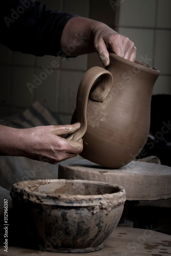 Pottery making. National pottery. Environmentally friendly ceramic dishes photo