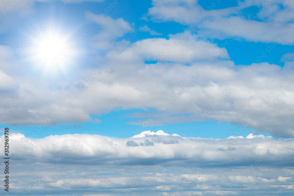 Beautiful blue sky with white clouds and sun Beautiful blue sky with white clouds and sun