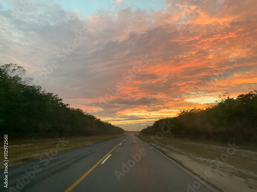 Endless road in Cuba, sunset © Filip