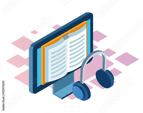 headphones and computer with book on screen
