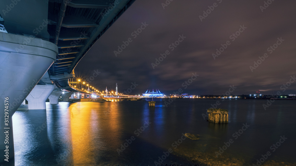  Petersburg Russia night landscape of modern city , view of the cable-stayed bridge over the Neva River, Stadium and the  tower.