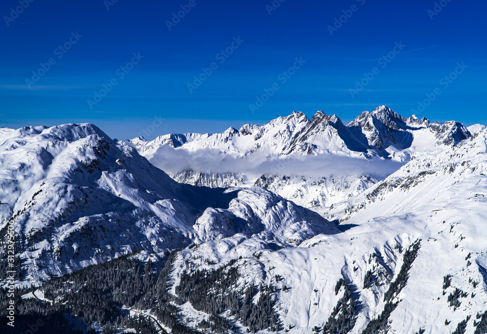 Beautiful Austrian Alps with blue skies near St. Anton in December 2019
