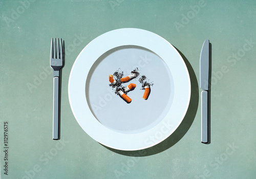 Cigarette butts on plate