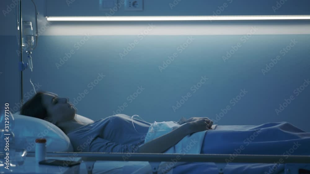 Woman's soul leaving her body during sleep on the hospital bed